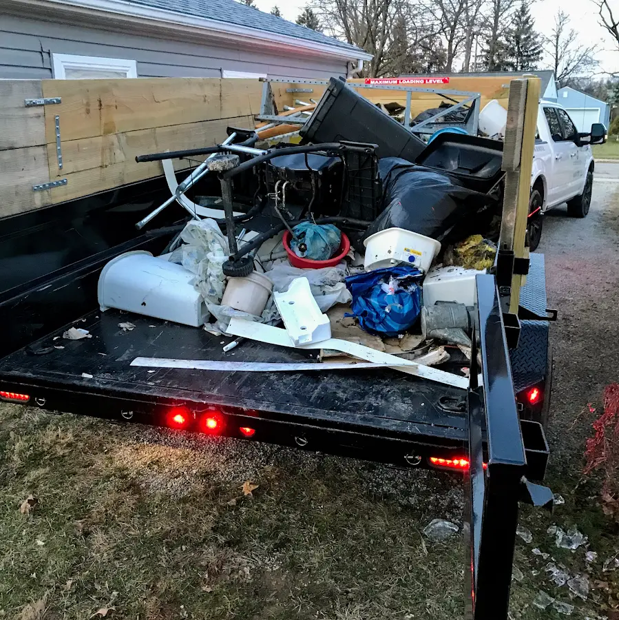 Roll-off dumpster delivered to a residential driveway in Whitewater